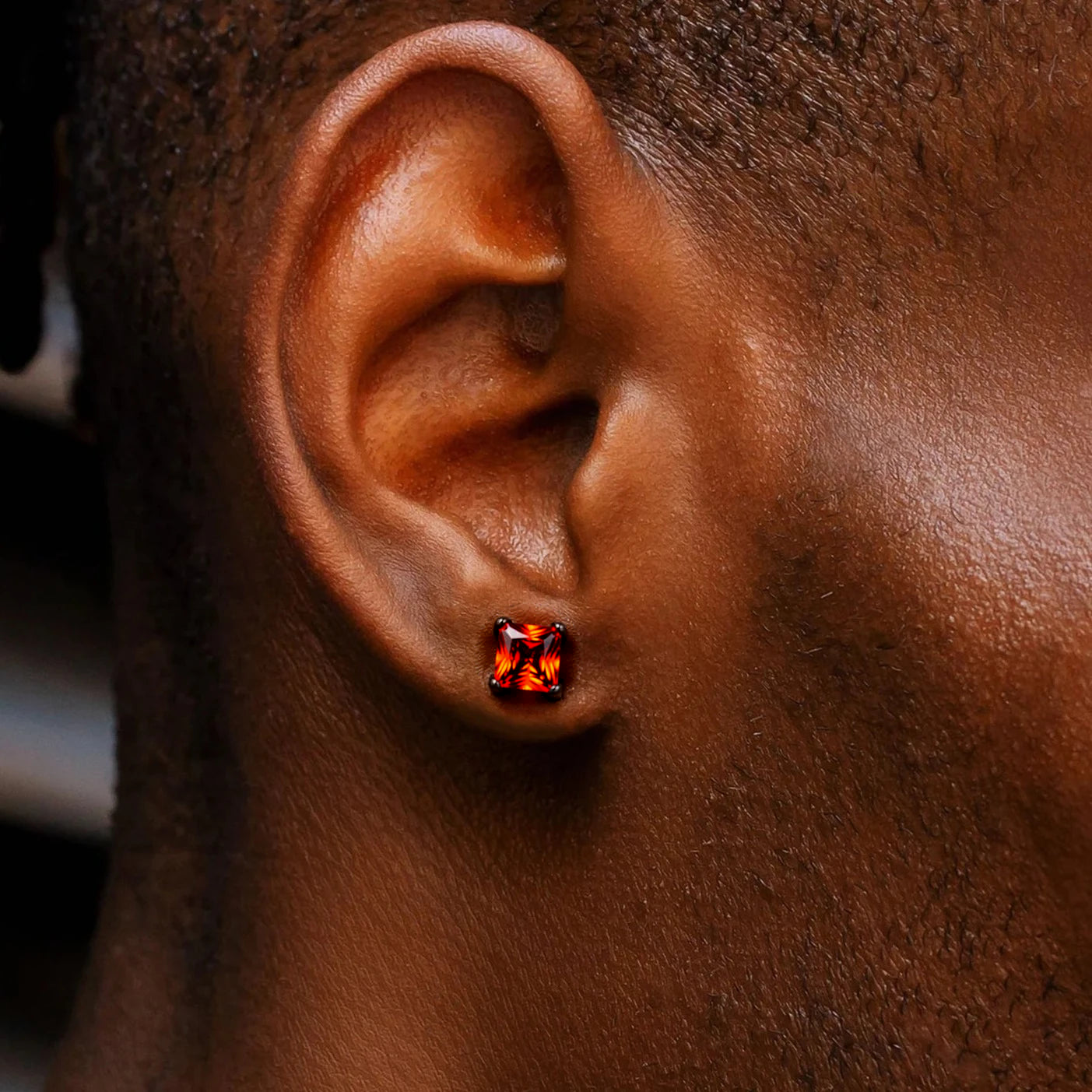 Red Stone Stud Earrings in Black Gold
